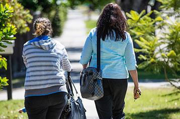 two women walking